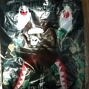 A Bathing Ape (Bape) Youth Medium Zipper T-shirt.